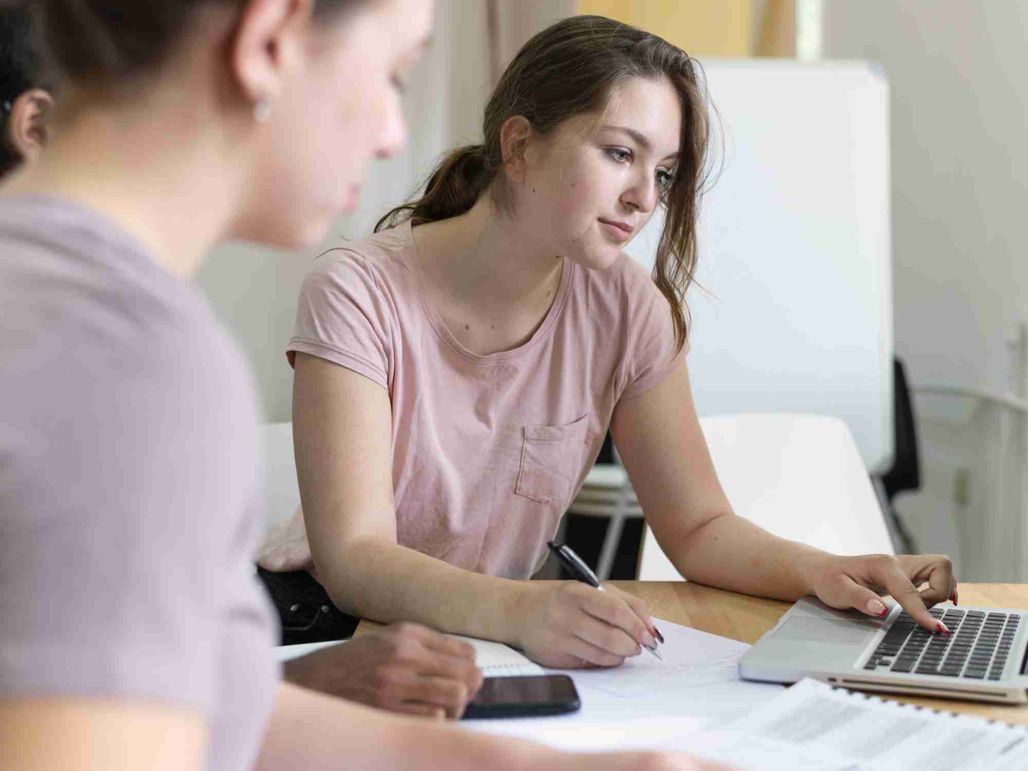 college girls studying together edited scaled
