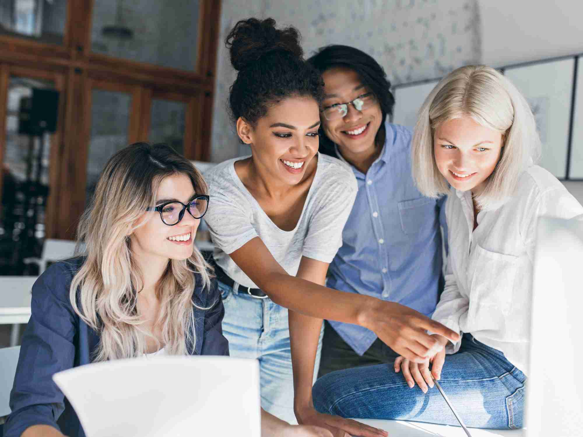 Seizing Financial Relief: Enhanced Tax Breaks for Foreign Residents' Allowances and Subsidies smiling black girl spending time office joking with colleagues edited scaled