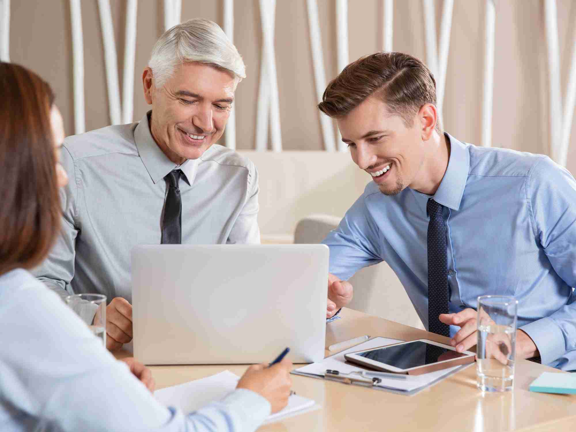 Incorporation vs employer of record (EOR) in China smiling enthusiastic business team working edited scaled